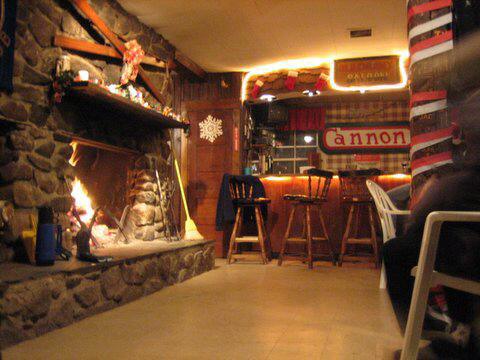 The fireplace and bar